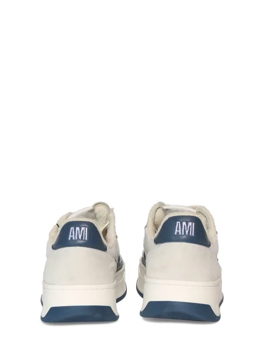 AMI Paris   New Arcade leather low top sneakers 
