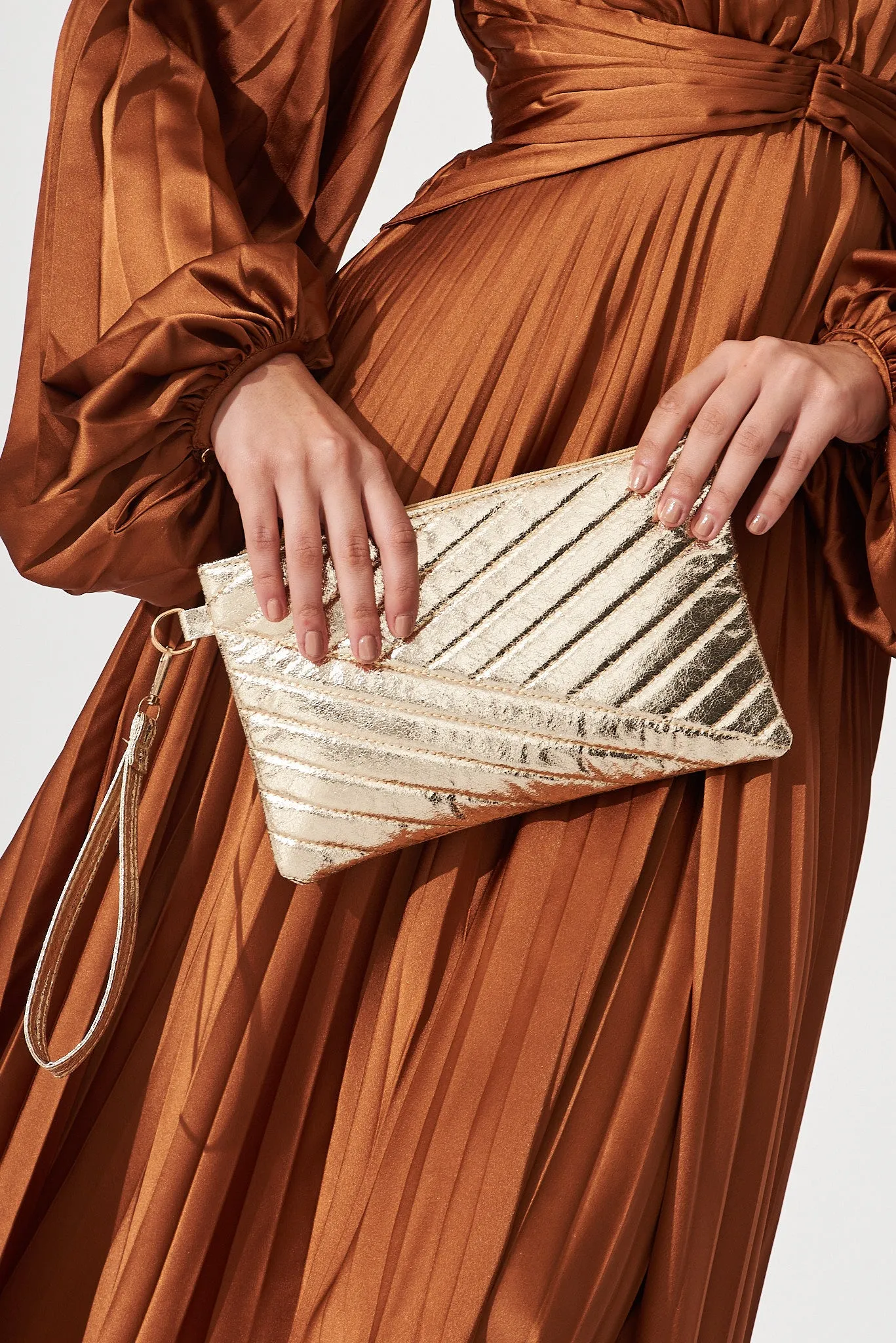 August   Delilah Mauriel Clutch In Gold
