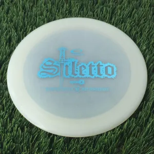 Latitude 64 Opto-X Stiletto with 10 Year Anniversary Sword Stamp - 176g - Translucent White